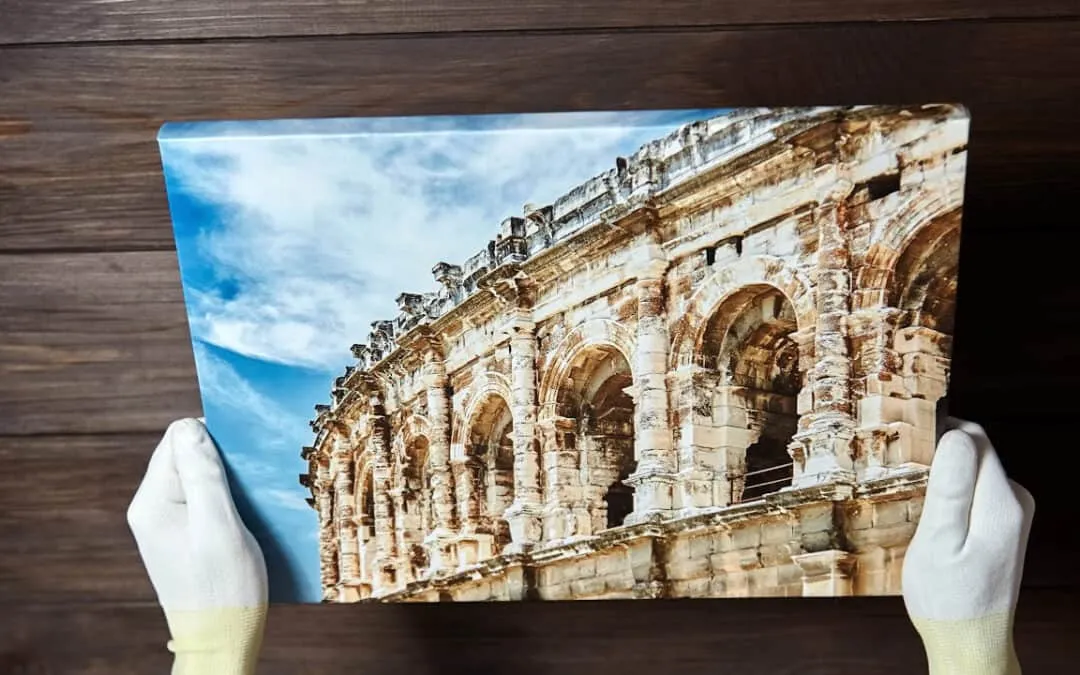 High quality canvas print of ancient Roman architecture being held with white gloves